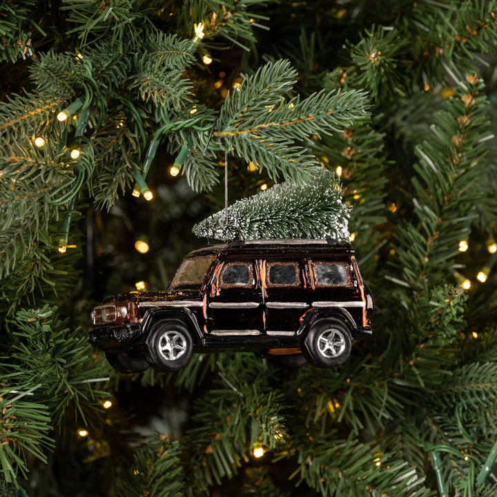 BROWN SUV W/ TREE ORNAMENT